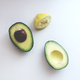 avocado and lemon on white background